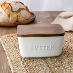 Leave it out on the counter or keep it in the fridge—butter will stay fresh in the dish. Hand wash and dry acacia lid.