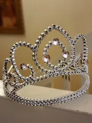Princess tiara crown accessory. The crown features 7 sparkly gems. Easy to put on and take off.  Perfect accessory for...