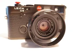 Includes: original Leica strap and half-case. Body only, lens is not included.