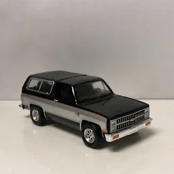 GL1981 CHEVY BLAZER MODEL BY GREENLIGHT COLLECTIBLES. FINISHED IN BLACK GLOSS PAINT, SILVER ACCENTS, AND BLACK...