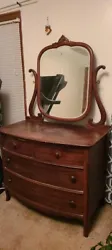 It could use to be refinished, small molding is missing by the top of the mirror. It is 41 1/4