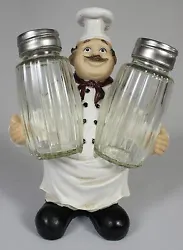 This cheerful, plump chef has just the right seasonings to enhance his culinary creations. Chef Salt & Pepper Holder....