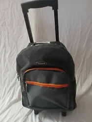 Spot Clean. Condition: Used Condition, Scratches & Scuffs throughout. Shoulder strap. Front pocket with organizor....