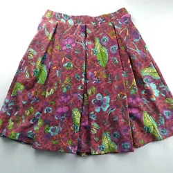 LuLaRoe pleated a-line skirt in dark red floral print with pockets and elastic waist. Size Large. Length 24