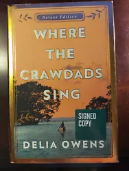 This is a like new, never read, signed deluxe copy of Delia OwensWhere the Crawdads Sing.