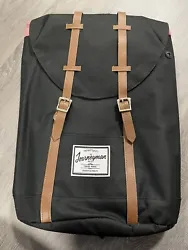 New The Journeyman Bag Co Canvas Black Laptop Backpack Red/White Striped Lining. New in bag and with tag. Bag measures...