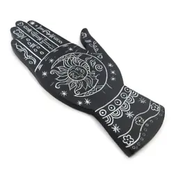 A slate-colored incense burner in the shape of a mystical palmistry hand. A hole in its center will hold your incense...