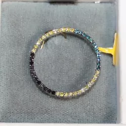 0.50 CTW Colored Diamonds. 24 mm wide.
