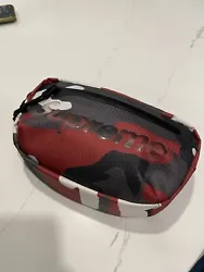 Supreme Waist Bag (SS21) Red Camo. Never used. Got as a gift, and don’t have any use for it.