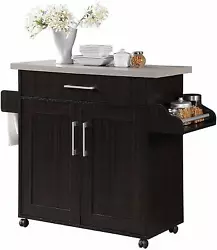 Finish: Espresso brown with gray top. This Kitchen Island can be used as a cabinet space as well as tabletop for small...
