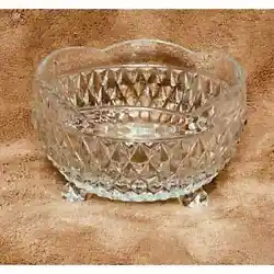 Beautiful candy dish features a very pretty scalloped edge, diamond point cuts, (3) footed base. Great addition to any...