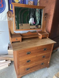 antique dresser with mirror. All wood, good condition. Measures 39.5” wide and 20” deep. Base stands 32” tall....