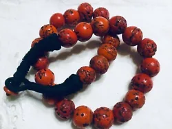 This necklace is so beautiful. This red color and appearance of the handmade beads is just amazing. The black thread is...