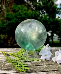 NOTE: The Fluorite crystal sphere you see in my photos is the exact one you will receive. This stone may cleanse and...
