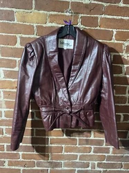 Vintage 90s Wilsons Genuine Leather Crop Jacket Size 14. Great conditioShoulder to shoulder 17 inchesArmpit to armpit...