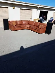Leather factory leather Sectional couch. Always Cleaned and condition With lexoil Cleaner air conditioner. Good overall...