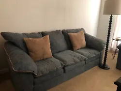 Sofa and Loveseat Set. Some cushions in the back have some tears, but overall it is in great condition. 