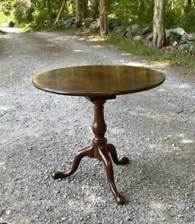Antique mahogany tripod breakfast table with birdcage tilt top. English, circa 1830. This is a very strong and stable...