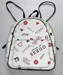 Guess Backpack Medium monogram live love guess white, black, red. Straps are belt style and adjustable. Clean inside...