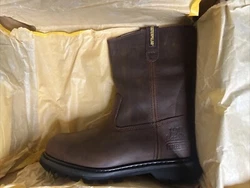 Step up your work game with these Caterpillar Revolver work boots. These durable boots have a steel toe and pull-on...