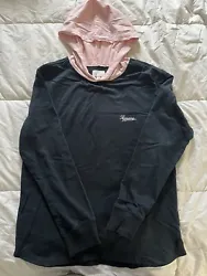 Supreme Kids shirt Size M. No stains but has been worn and washed The color is dark blue with light pink hoodie