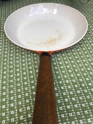 Vintage Cast Iron Wood Handle Fry Pan Skillet Flame Orange with made in USA on bottom of pan.Has some staining of...