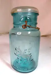 Nice used jar, copyright dated 7/14/1908. Blue jar w/ clear lid. Not sure the bail is complete. See pics.