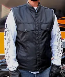 OUTLAW CYCLE PRODUCTS. Textile Motorcycle Vest. Concealed carry gun pocket on both sides. Reinforced shell is water and...