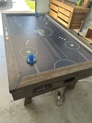American Legend Air Hockey Table- Small Damage, Works Great.. Condition is Used. Shipped with USPS Priority Mail.