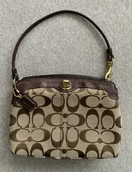 COACH Brown Canvas Leather Wristlet Small Purse Clutch. Good condition just spats inside the purse and in the button...