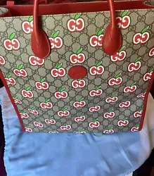 GUCCI Large Apple Tote. GG Supreme Canvas Apple Tote Bag. Out of print. Hook closure. 2 inside zip pockets. 3” small...