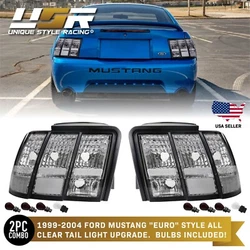 1999-2004 Ford Mustang. x2 Rear Tail Lights (Left + Right). Color: Clear Lens. Bulb Specifications: 3157 Red...