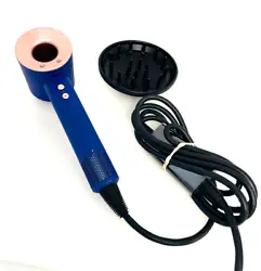 Color Vinca Blue/Rose. Used item. Minor scratches possible. Dyson Canada Hair dryer 120V, Can only be used in the US...