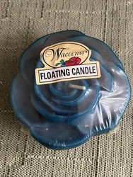Turquoise Rose Shaped Floating Candle By Waccents. Rose shaped floating candle, turquoise colored wax by Waccents....