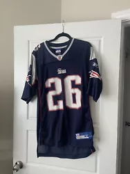 New England Patriots Wilson # 26 Reebok NFL Football Jersey Size M. Condition is Used. Shipped with Economy Shipping.