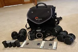 MINOLTA Maxxum 5000i Camera with 4 lenses film and cards no battery Works. Good condition please use personal grading...