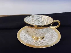 Karol China Warranted 22k Gold Teacup and Saucer.  The exquisite teacup and saucer is in excellent condition and would...