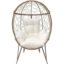 Cozy lounger - Topped with soft padded cushions, lumbar and headrest pillows, this basket chair enhances the overall...