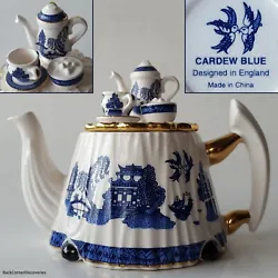 You are buying one (1) authentic Cardew Blue teapot. This elegant, snowy white earthenware, single serving teapot is...