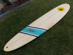 This is a Vintage Collectable Hobie Long board Surfboard and Dakine Bag package. The board is approx 8 6 1/2