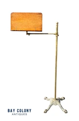The height and angle of the book rest can be easily adjusted with a brass thumb screw. The small brass rods on the...