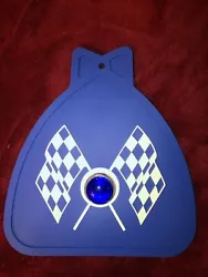 MUDFLAP IN BLUE WITH BLUE & WHITE CHECKERED CROSS FLAGS AND BLUE JEWEL. YOU GET ONE MUDFLAP IN BLUE. WITH CHECKERED...