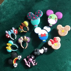 Add some fun to your childs shoes with this set of 12 Disney Minnie Mouse and Mickey Mouse ears with balloons shoe...