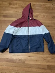 Vintage windbreaker/waterproof jacket. Pre-owned.. Color: Burgundy/Cream white/Navy BlueString to hoodie halfway out.