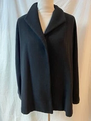 Elegant and easy black wool jacket from Eileen Fisher.  Laid flat, measures 22.5