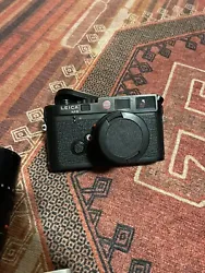 Leica M6 35mm RangeFinder Camera - Black. With 50mm and 90mm lenes and two rolls of new Ilford HP5 Plus 35 mm film....