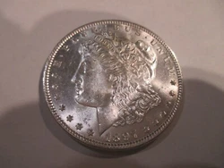 1897 Choice BU + Morgan Silver Dollar.