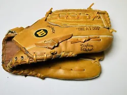 Wilson The A7000 Baseball Glove Nylon Stitched RHT. Item in good condition . This is for a person that throws with the...
