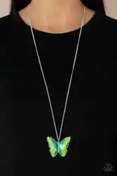Featuring a UV effect, dramatically faceted green and blue gems adorn the wings of a silver butterfly, creating an...