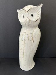 This Owl is very pretty has a cracked glazed finish it makes it look unique.No breakage 13 1/2 inches tall4 1/2 inches...